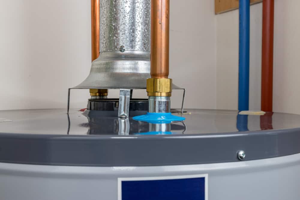 High-efficiency water heater installation for residential plumbing and heating systems.