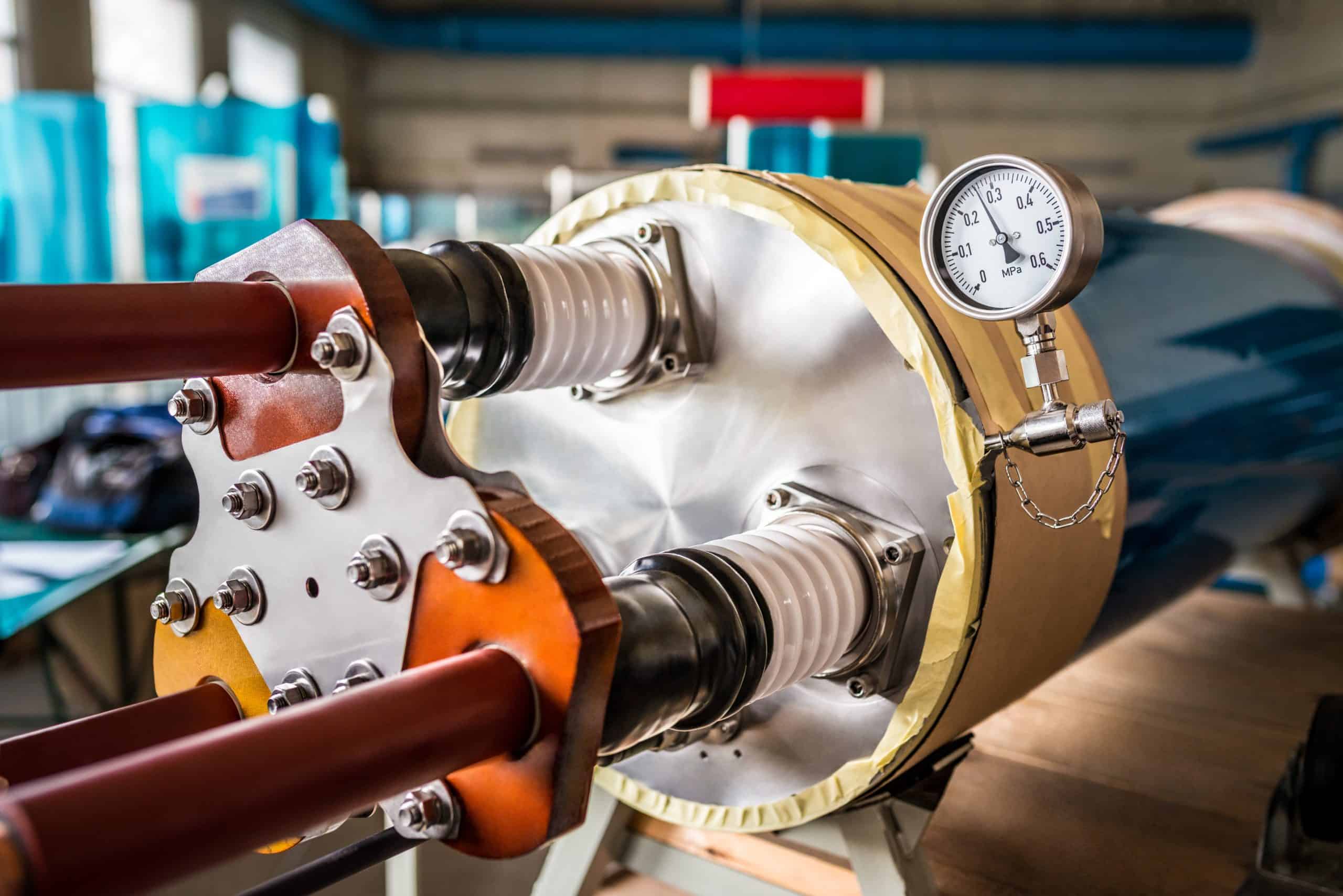 High-pressure boiler component for plumbing heating systems with gauges and valves.