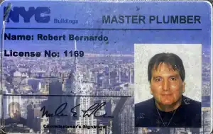 Master plumber license card with NYC skyline background and professional photo.
