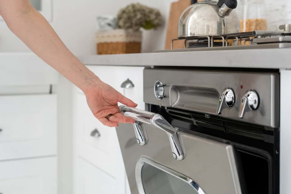 High-quality kitchen stove with plumbing connections for professional plumbing and heating services.